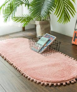 Pom-pom Trimmed Oval Anti-skid Rug